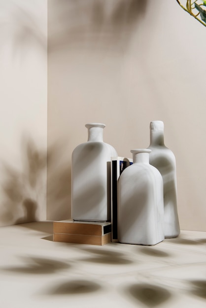 White vases and books assortment