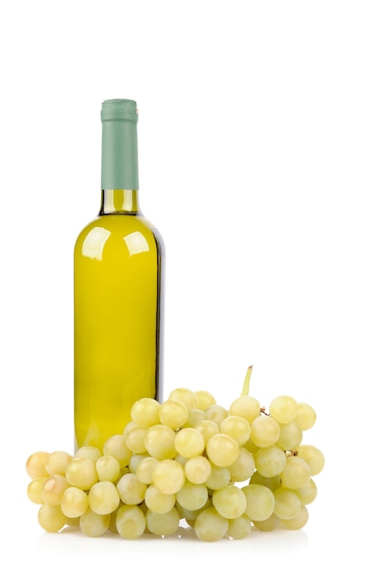 White wine bottle and grapes isolated on white