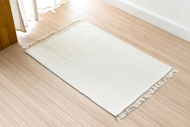 Free photo white woven carpet background on the floor