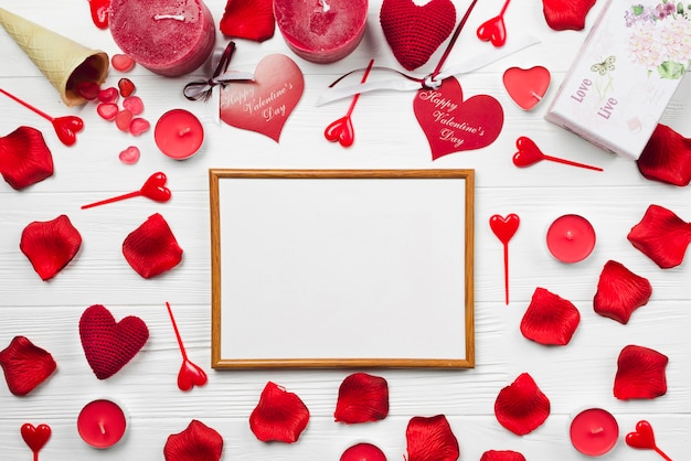 Free Photo whiteboard amidst valentine's day decorations