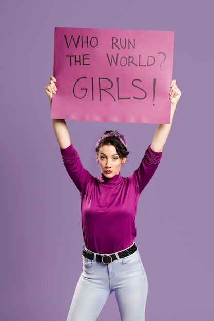 Free Photo who run the world? girls! lettering with woman standing