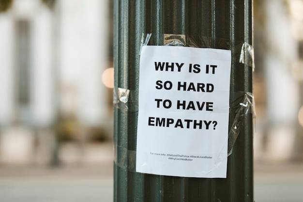 Free Photo why is it so hard to have empathy, flyer on a pole in downtown los angeles. 1 jul, 2020, los angeles, usa