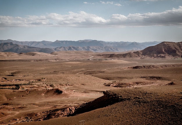 Free Photo wide angle shot of large areas of arid land and mountains