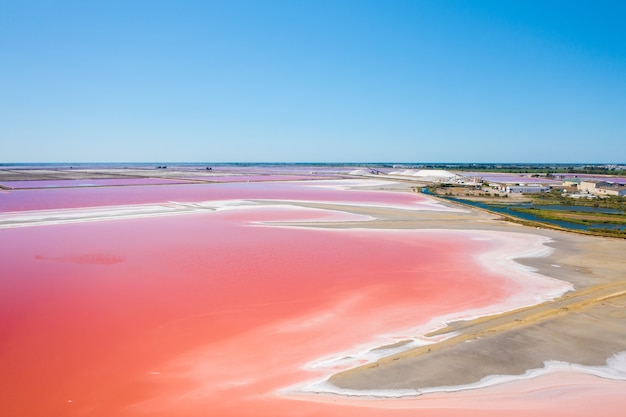 Free photo wide angle shot of the multicolored salt lakes in camarque, france