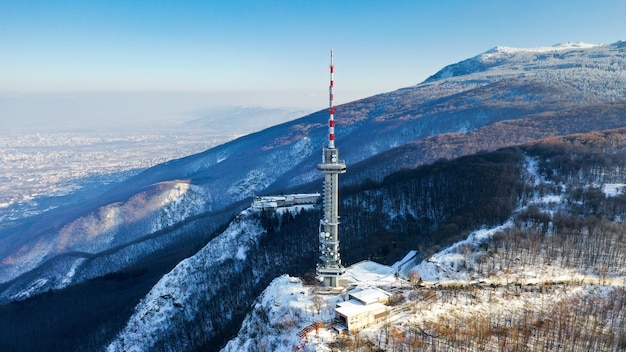 Free Photo wide angle shot of a satellite tower on the mountain