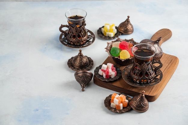 Wide angle of traditional tea table. Fragrant Tea and sweet Candies