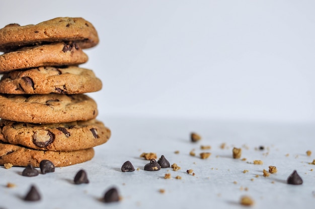 Wide selective closeup shot of a stack of baked chocolate cookies