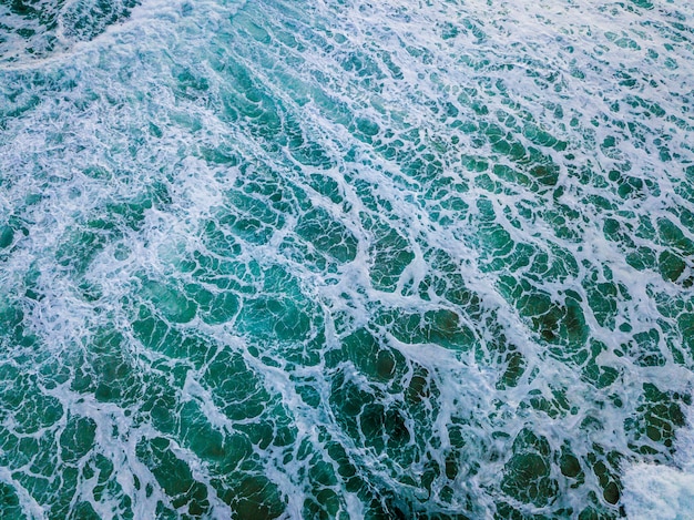 Wide shot of blue ocean waves