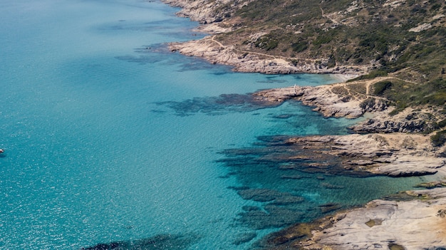 Free Photo wide shot of landmasses by a blue ocean