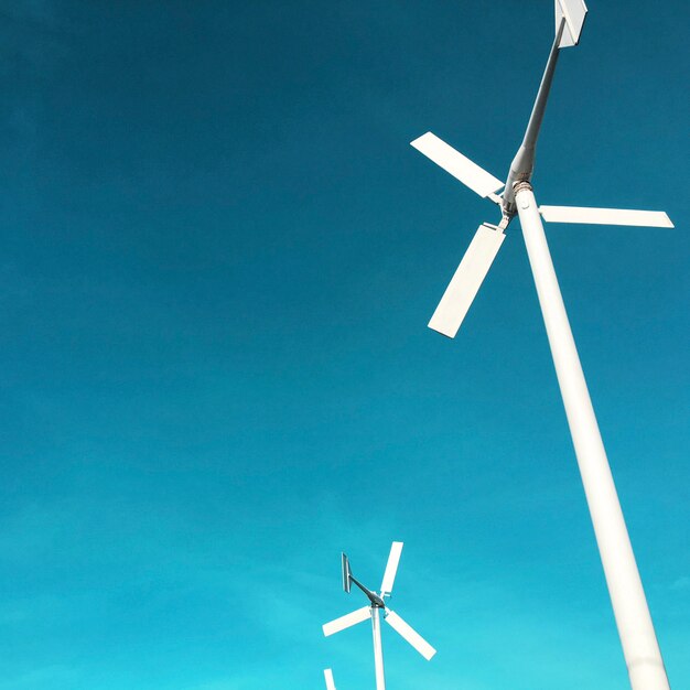 Free Photo wind turbine power generator with blue sky