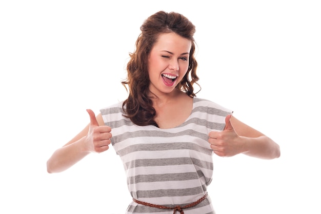 Free Photo winking woman showing ok sign