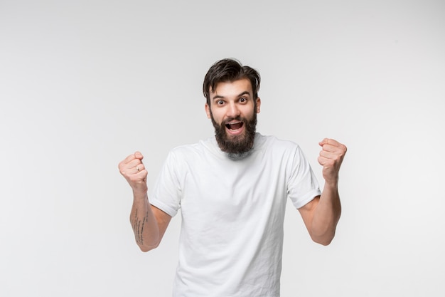 Free photo winning success man happy ecstatic celebrating being a winner