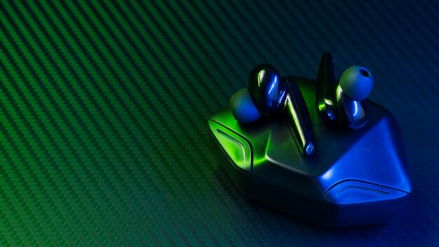 Wireless earbuds with neon cyberpunk style lighting