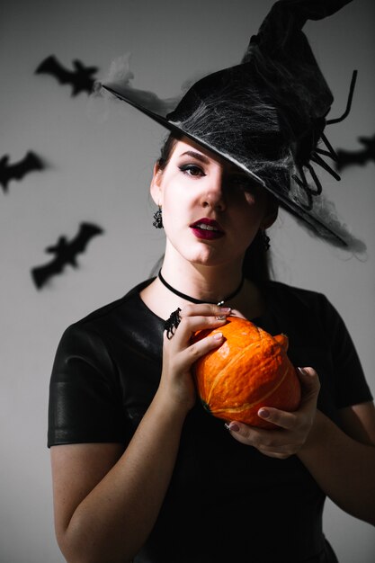 Witch with pumpkin