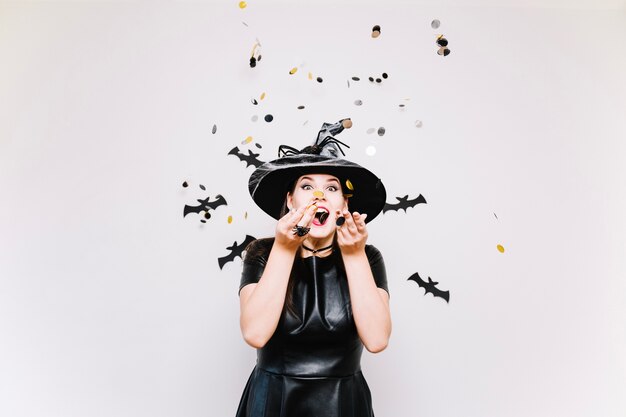 Free Photo witch woman with colorful confetti