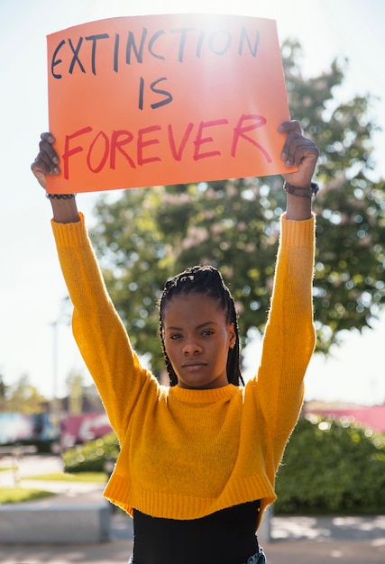 Woman activist holding placard