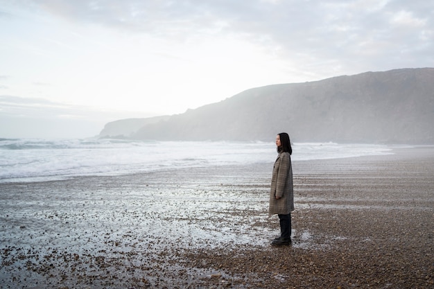 Free photo woman alone on the beach