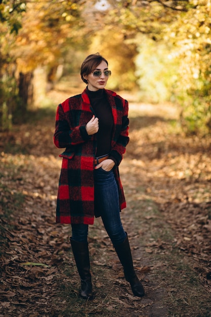 Woman in autumn park