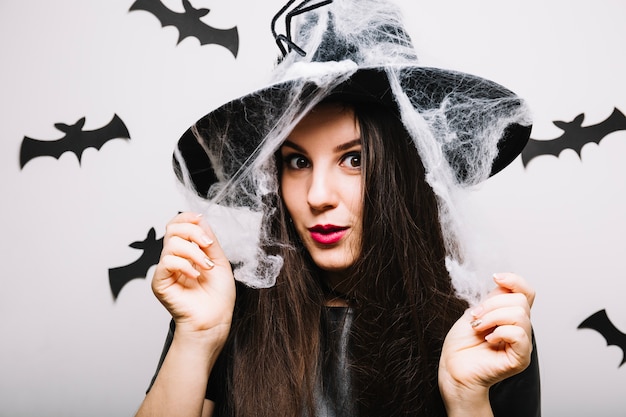 Free Photo woman in bats posing with web