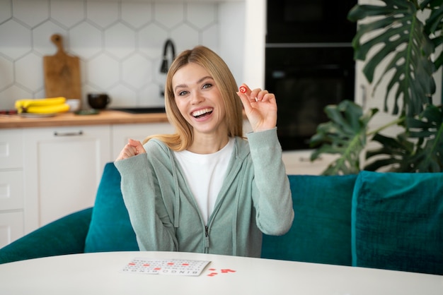 Free photo woman being passionate about playing bingo