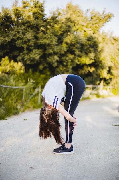 Woman bending and meditating