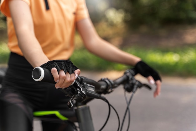 Woman on bicycle side view