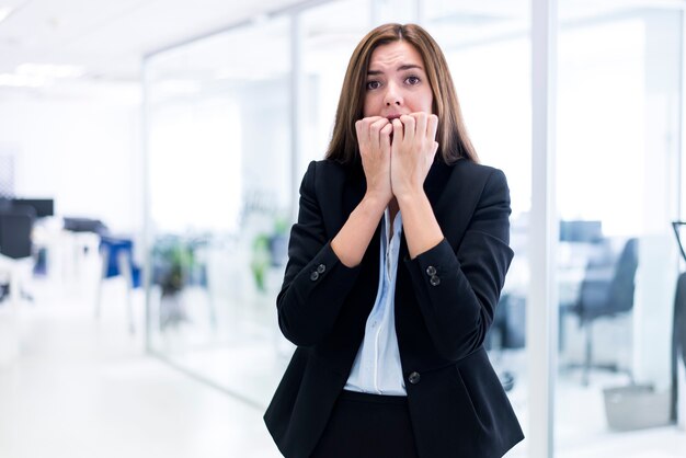 Woman biting his nails