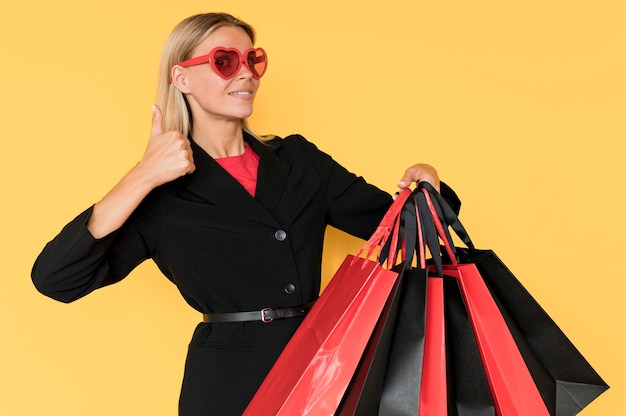 Woman on black friday sale thumbs up gesture