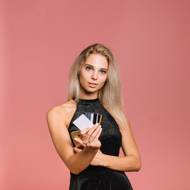 Free photo woman in black with credit cards