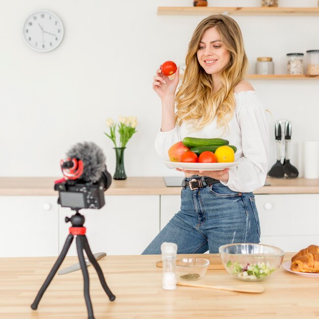 Woman blogger cooking healthy food