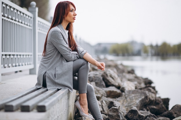 Woman by lake