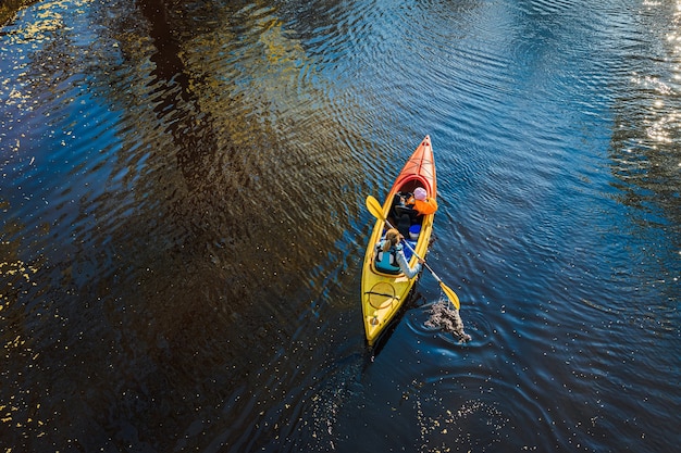 Free Photo woman canoeing on the water during daytime