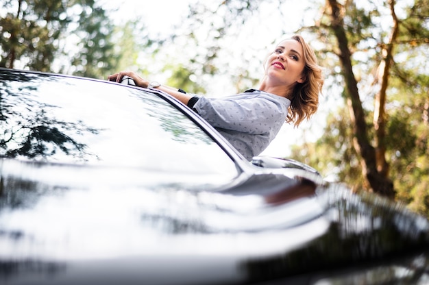 Woman in car looking away