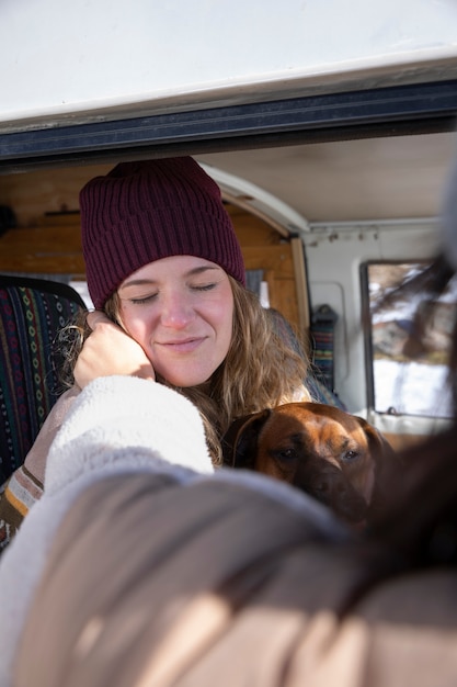 Woman caressing her lover's cheek during winter trip