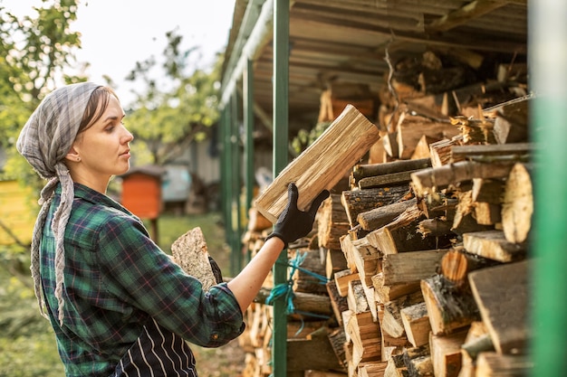 Woman carring fire wood