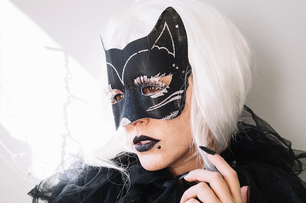 Free photo woman in cat mask