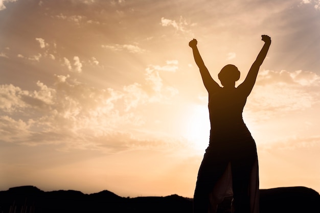 Free Photo woman celebrating after yoga session