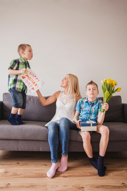 Free photo woman celebrating mother's day with her children