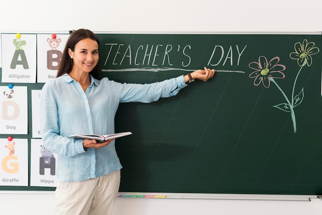 Woman celebrating teacher's day with her students