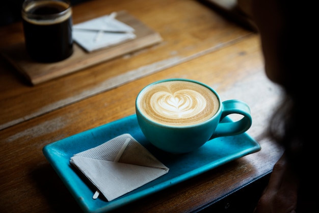 Free photo woman chilling out with coffee at cafe