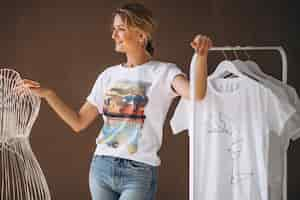 Free photo woman chosing a white shirt