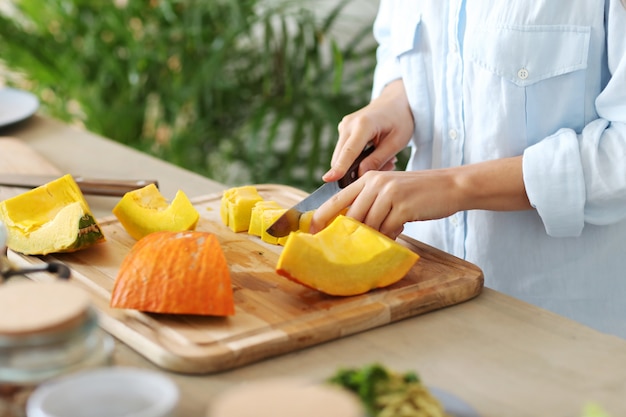 Woman cooking at the kitchen