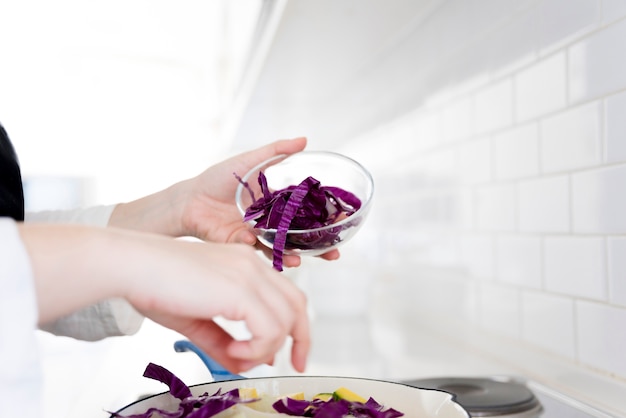 Woman cooking in kitchen