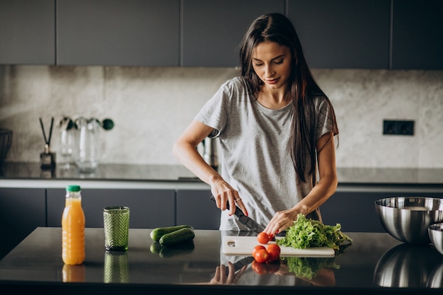 Woman cooking lunch at home