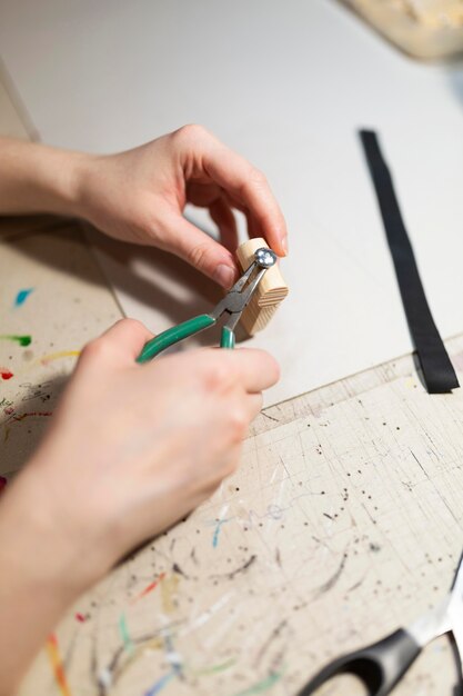 Woman crafting a wood piece