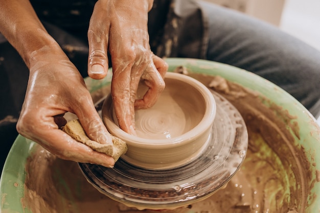 Woman craftmaster at a pottery shop