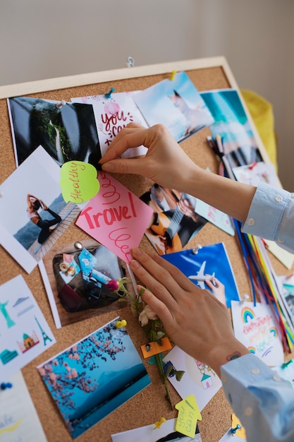 Free Photo woman creating their own vision board