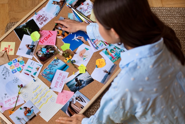 Free Photo woman creating their own vision board