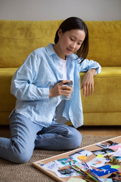 Woman creating their own vision board