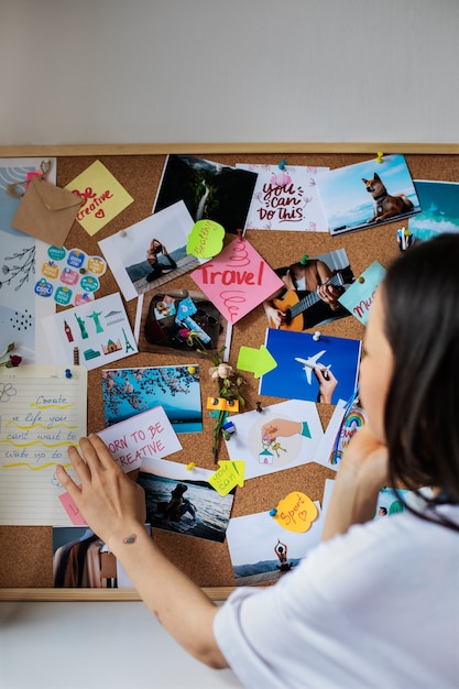 Woman creating their own vision board